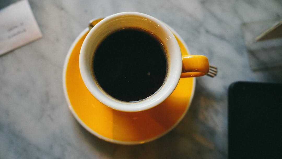 coffee in an orange mug